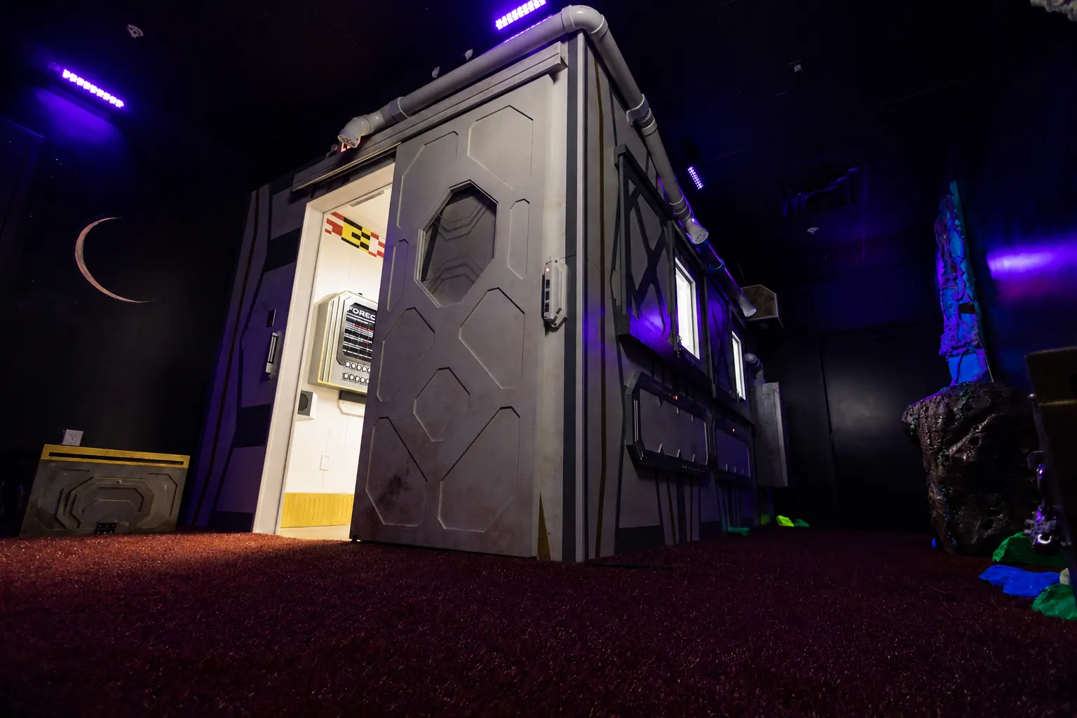 The spacecraft airlock set inside the Airlock sci-fi escape room in McKinney, TX